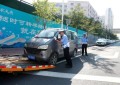 “僵尸车”清障行动  冰城公安为公共空间“腾位”